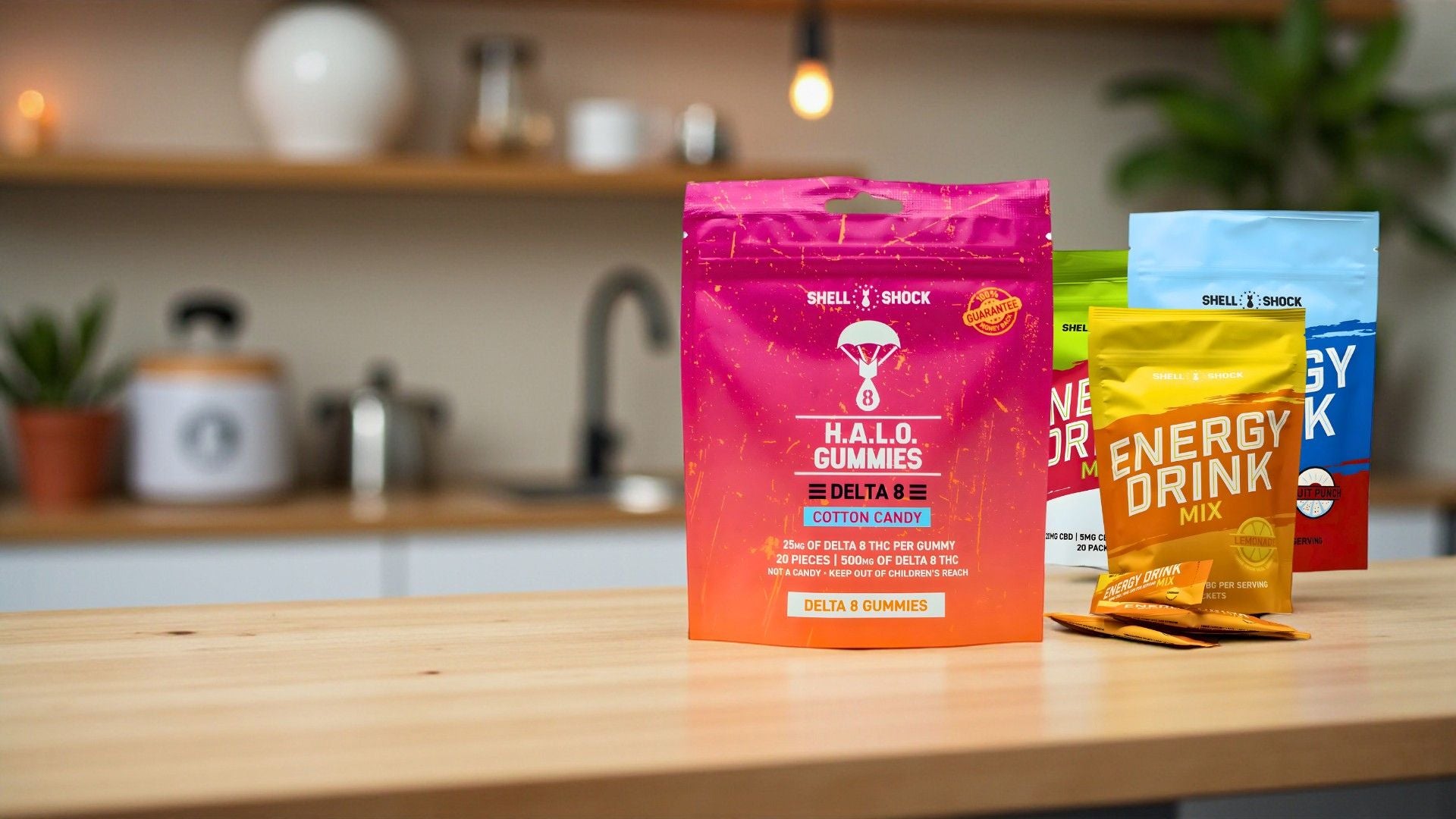Assorted energy drink mixes on a kitchen counter